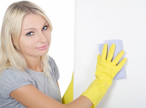 Commercial cleaning team sanitising office desks in Harrow